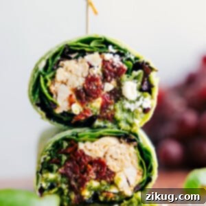 Mediterranean Wrap cut in half and stacked on top of each other.