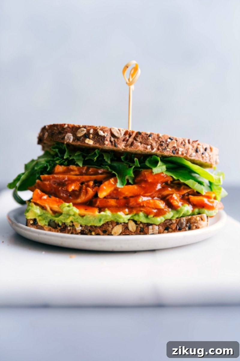 The delicious and stuffed BBQ chicken sandwich, ready to be devoured.