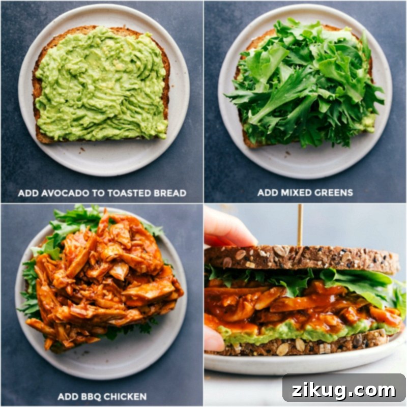 Assembling the best BBQ chicken sandwich recipe by adding creamy avocado to toasted bread, layering with mixed greens, chicken, and topping with the other piece of bread.