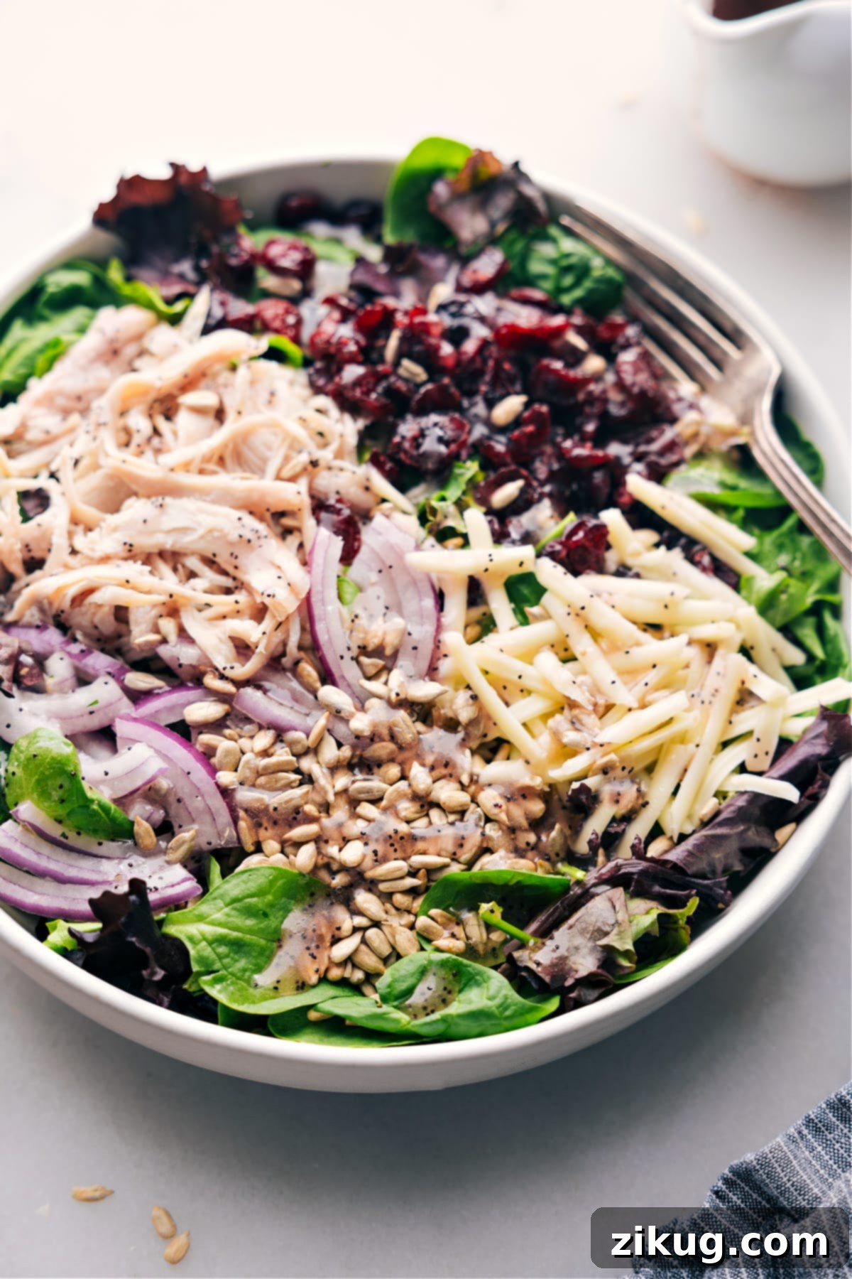 A beautifully dressed Turkey Cranberry Salad, ready to be served and enjoyed, showcasing all its delightful ingredients.