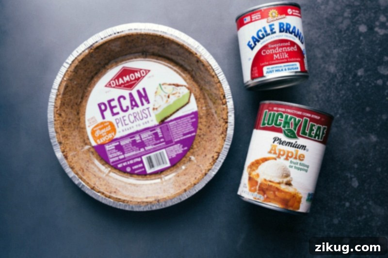Assorted high-quality packaged ingredients used for a quick and easy Apple Streusel Pie recipe, including pie crust and apple pie filling.