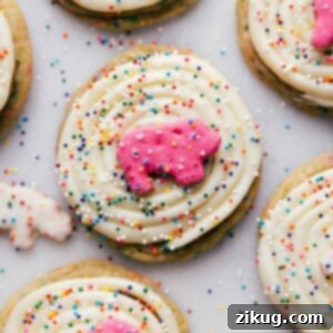 Finished decorated and delicious animal circus cookies generously frosted with colorful sprinkles added on top.