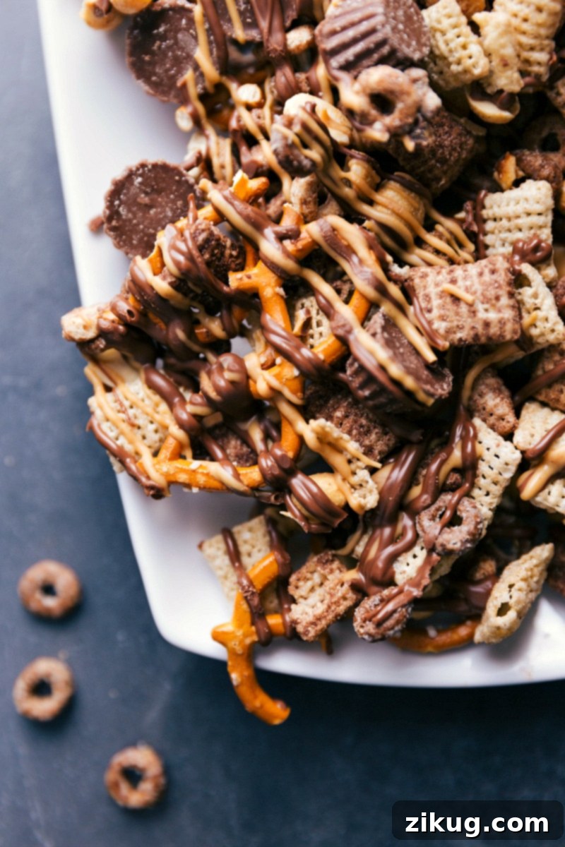 Ready to Impress - Chocolate Peanut Butter Snack Mix for Any Gathering The finished chocolate peanut butter snack mix elegantly displayed on a serving platter, inviting guests to enjoy its delightful crunch and flavor.