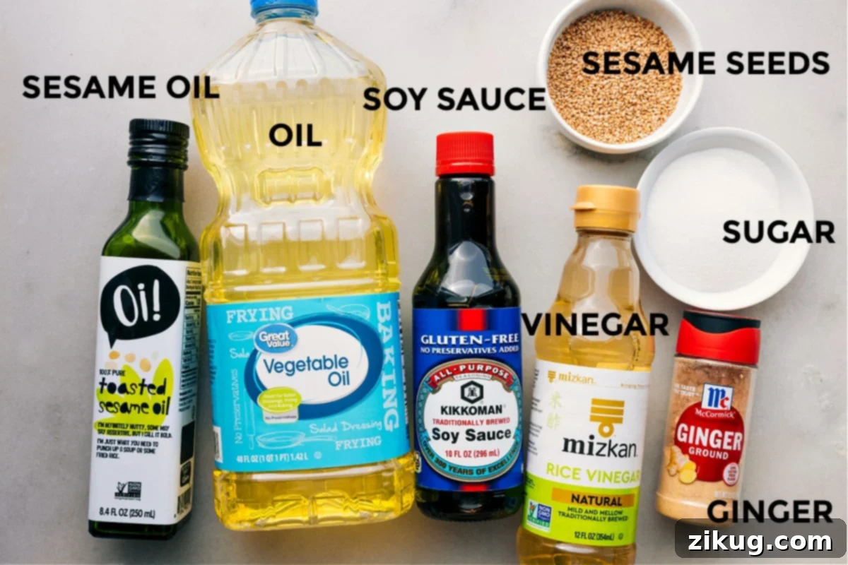 Dressing ingredients prepped and ready: sesame oil, vegetable oil, soy sauce, vinegar, sesame seeds, sugar, and ginger.