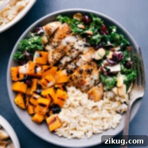Harvest Bowl with grilled chicken, butternut squash, brown rice, and kale salad