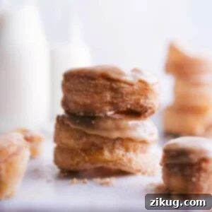 Stack of glazed cronuts, showcasing the ideal blend of flavor and texture.