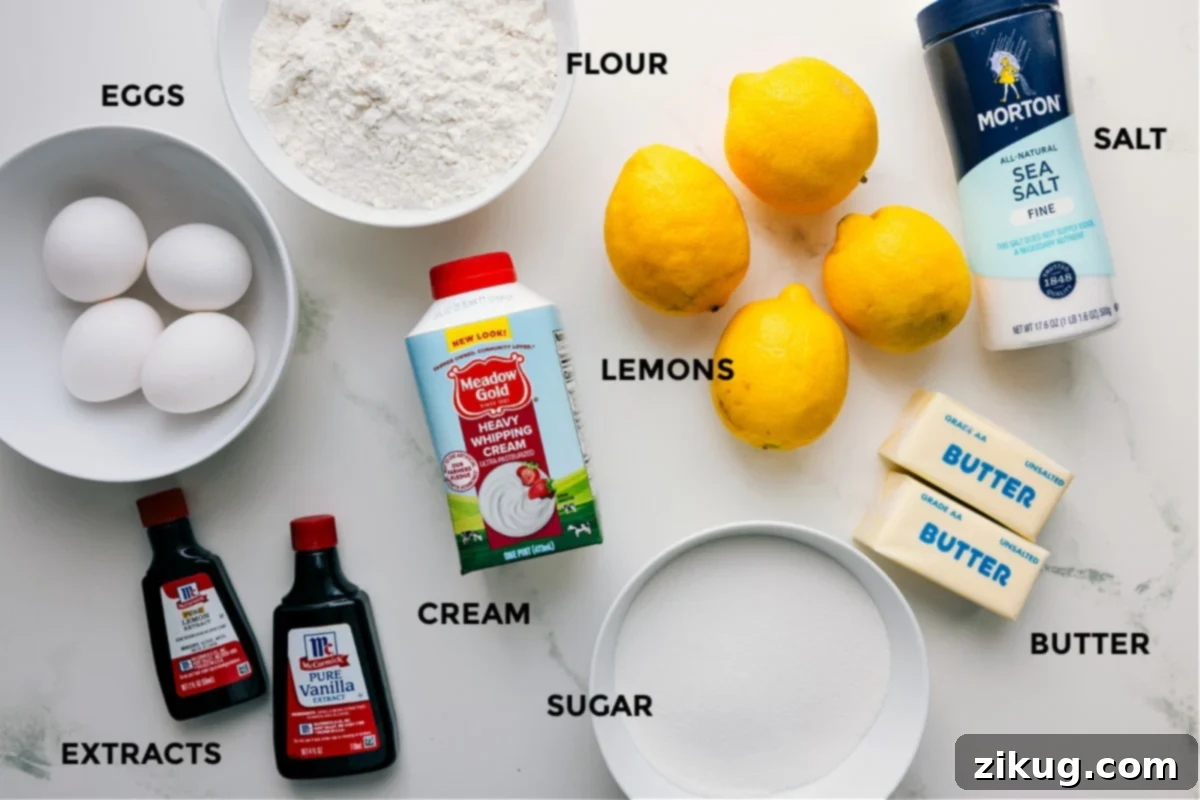 All the essential ingredients for making homemade lemon bars, neatly prepped and arranged, including fresh lemons, eggs, flour, butter, sugar, cream, and extracts.