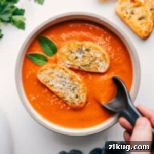 Close up of creamy tomato soup bowl