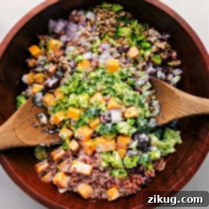 Classic Broccoli Salad 2 A beautiful bowl of broccoli salad, featuring crisp broccoli, vibrant cranberries, and savory bacon, ready to be dressed.