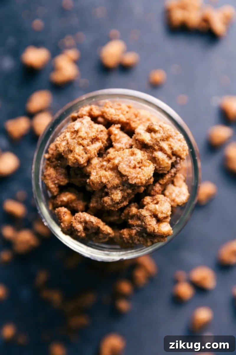 Perfectly golden and flavorful candied walnuts presented in a rustic cup, ready for enjoyment.
