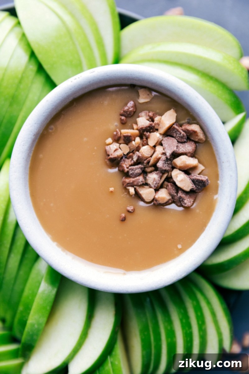 Caramel Sauce with Chopped Heath Bars Bowl of caramel sauce topped with chopped Heath bars, ready to be enjoyed.