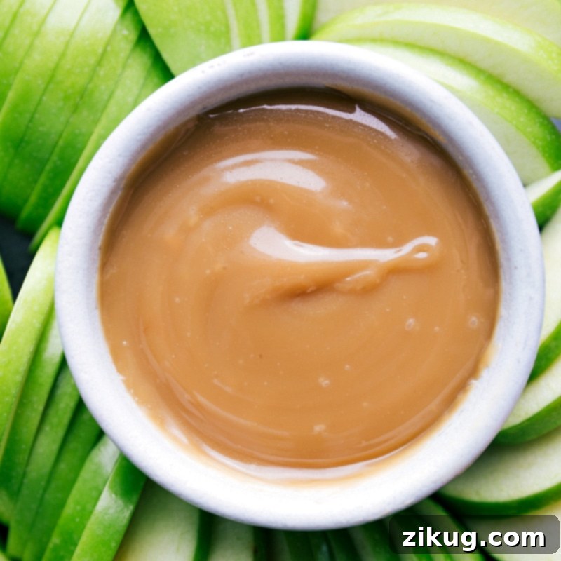 Creamy Caramel Sauce in a Bowl The finished caramel sauce recipe in a bowl, creamy and smooth, ready to be enjoyed.