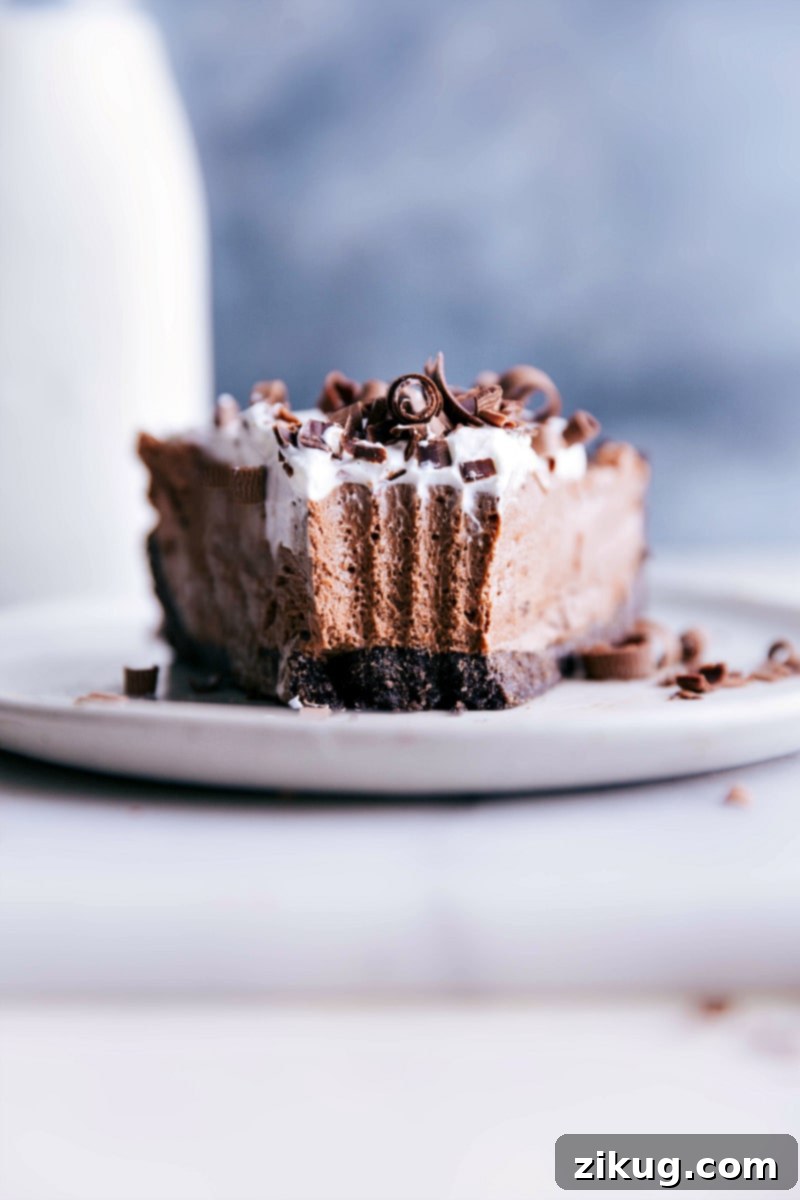 An irresistible slice of dessert with a bite taken out, revealing its delicious layers.