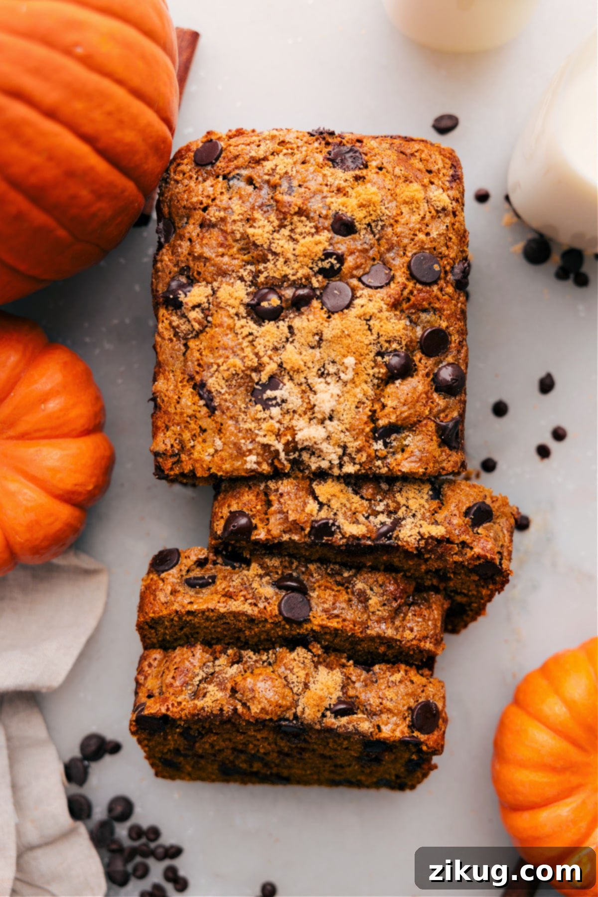 Healthy Pumpkin Bread Slices A loaf of moist pumpkin bread with a rich orange color, sliced and ready to enjoy.