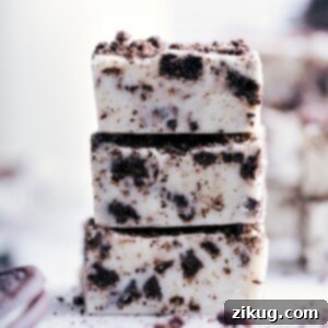Ultimate Oreo Fudge 2 Stack of three pieces of the dessert.