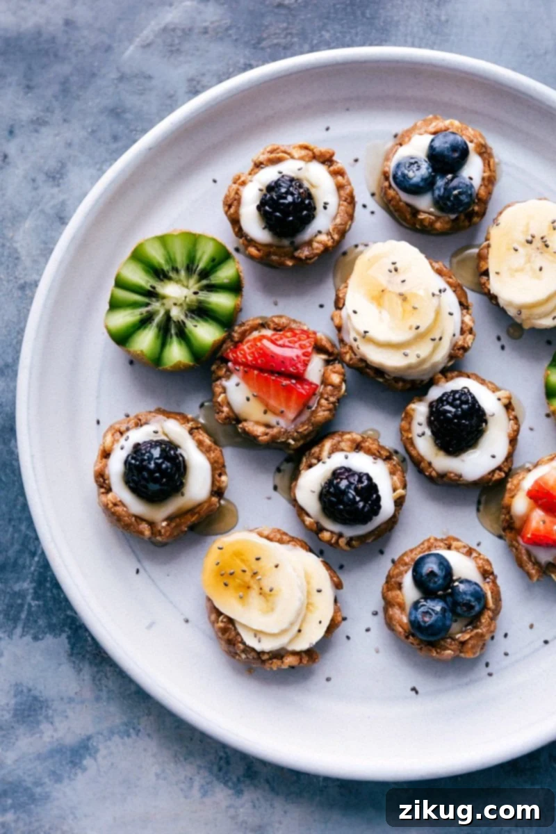 Healthy Fruit Tarts with an Assortment of Fresh Toppings Healthy fruit tarts beautifully displayed on a tray, adorned with a variety of fresh fruit toppings.