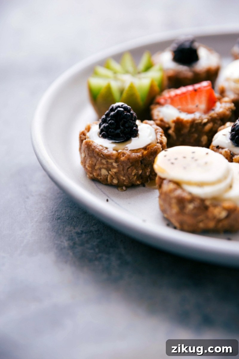 Plateful of Healthy Fruit Tarts: Crust and Fresh Toppings A plate full of healthy fruit tarts, showcasing both the crust and the delightful fruit toppings.