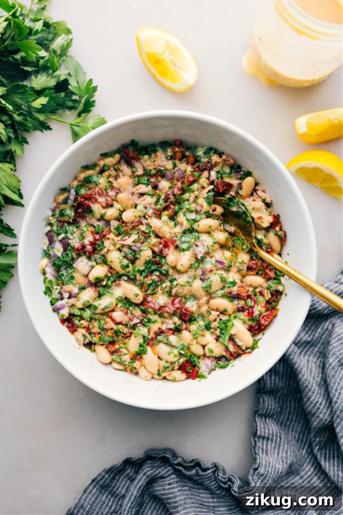 The Best Tuna-White Bean Salad Recipe A beautifully presented bowl of Tuna-White Bean Salad, vibrant with fresh ingredients, ready to be served and enjoyed.
