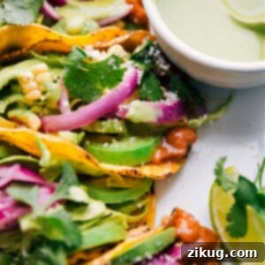 A close-up image of a delicious pinto bean taco.