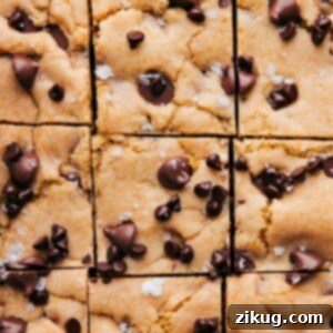Chocolate Chip Cookie Bars cut into squares, ready to be served