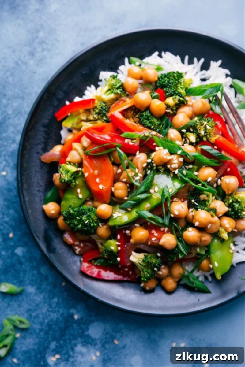Overhead image of General Tso Chickpeas over a bed of rice.