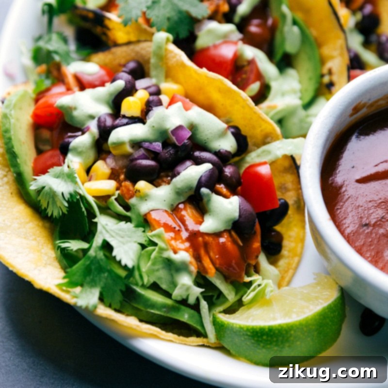 Ready-to-Eat Meal with Nearby Bowl of Barbecue Sauce Finished meal, delicious and ready to eat, with a bowl of barbecue sauce nearby.