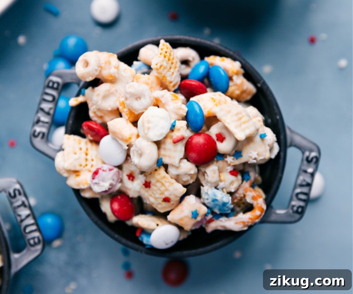 Making and Enjoying the Best 4th Of July Snack Mix A beautifully presented bowl of the finished 4th of July snack mix ready to be enjoyed by guests.