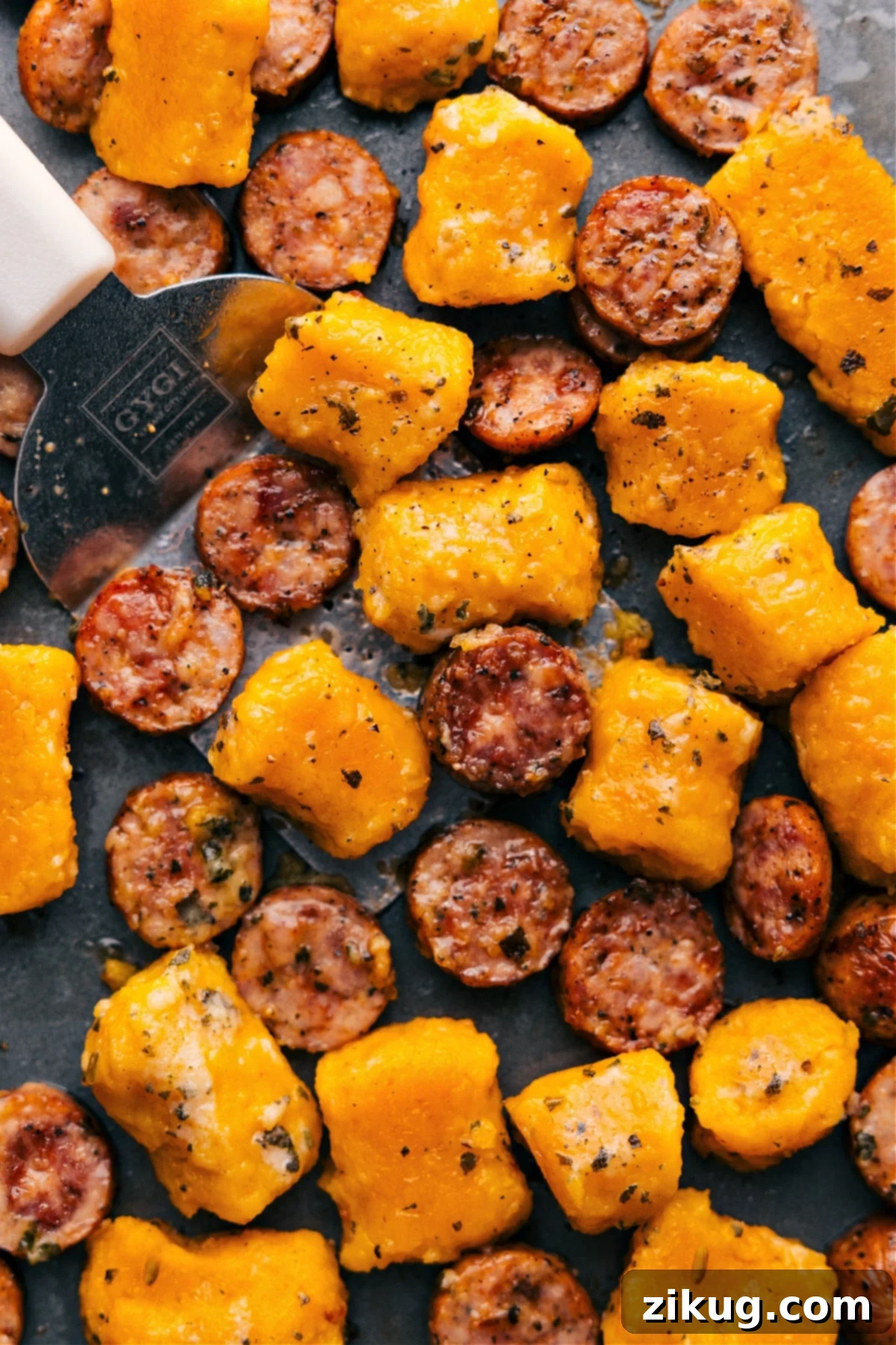Easy Trader Joe's 3-Ingredient Recipes 2 A beautifully presented dish of roasted sweet potato gnocchi and Italian chicken sausage, perfectly golden brown and ready to be tossed with pesto.