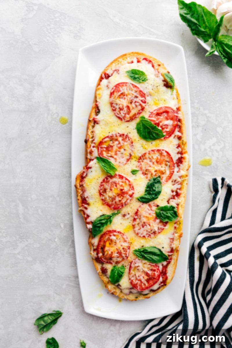 Crispy Baguette Margherita 2 Delicious Margherita French Bread Pizza with fresh basil garnish
