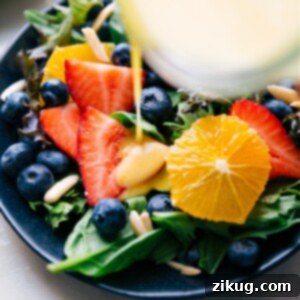 Vibrant image of the finished Citrus Vinaigrette in a serving bowl, garnished with citrus slices, ready to be enjoyed.