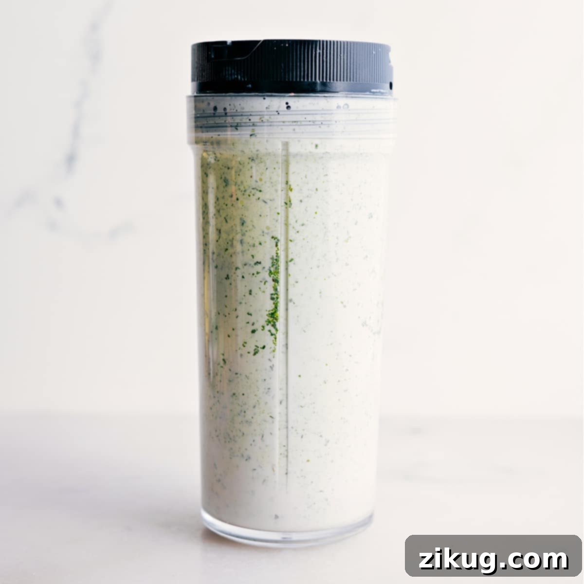 How To Make Green Goddess Dressing The dressing is blended in a blender jar.