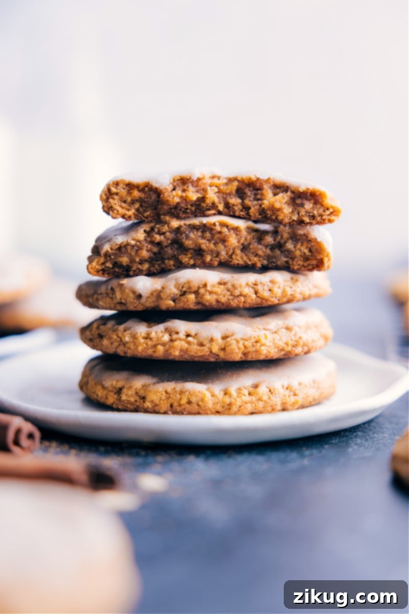 Soft, Chewy, and Perfectly Spiced Pumpkin Oatmeal Cookies with an Optional Glaze Image of the Pumpkin Oatmeal Cookies on a plate, showcasing their soft, chewy texture and delicious glaze.