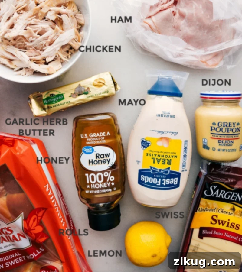 These Chicken Cordon Bleu Sliders pack a serious flavor punch! Recipe via chelseasmessyapron #dinner #quick #easy #simple #familyfriendly #kidfriendly #onepan #appetizer #chickencordonbleu #sliders An array of fresh ingredients for Chicken Cordon Bleu Sliders, neatly arranged on a countertop