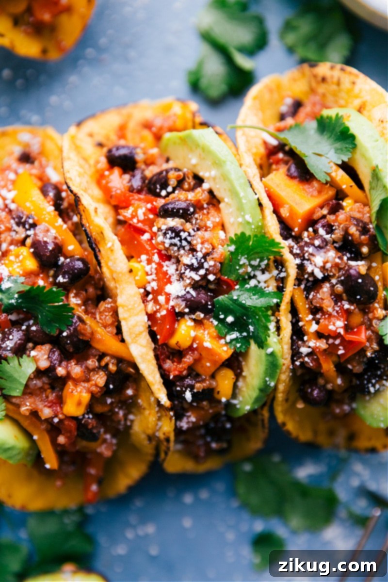 Perfectly assembled Quinoa Fajitas, showcasing vibrant toppings and delicious filling. Up-close image of the colorful and inviting Quinoa Fajitas with a generous array of fresh toppings, ready to eat.