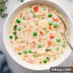 Chicken and potato soup in a bowl ready to be enjoyed.