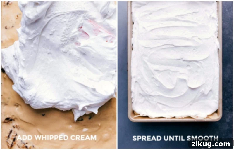 Final Layer: Adding Whipped Topping to Brownie Ice Cream Bars A smooth layer of whipped topping being added to the top of a layered brownie ice cream dessert, completing the final step.