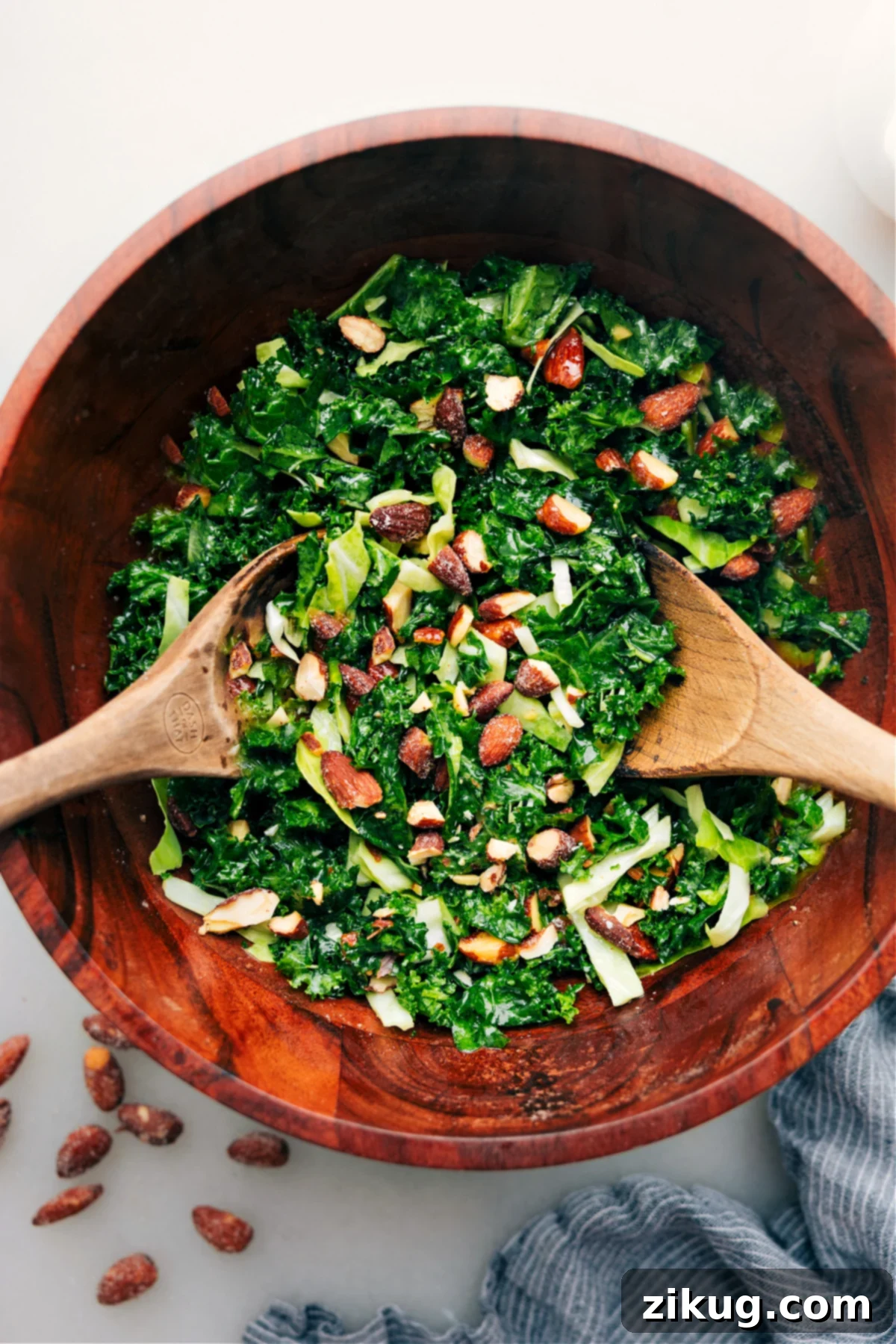 The Best Chick-Fil-A Kale Salad Copycat Recipe A vibrant bowl of Chick-fil-A Kale Salad copycat, perfectly tossed and ready to be served, showcasing its fresh ingredients and inviting textures, making it an irresistible, healthy meal option.