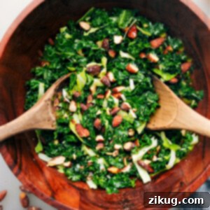 Chick-Fil-A Kale Salad copycat in a bowl, showing the crisp greens and crunchy almonds tossed in dressing, ready to be served.