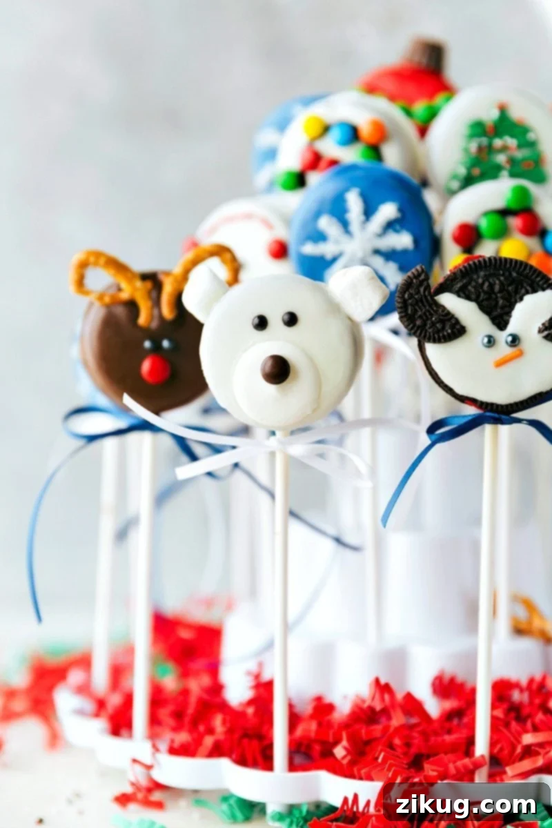 A full collection of adorable Christmas Oreo pops including a snowman, Christmas tree, ornament, and polar bear. Image of all the Christmas Oreo Pops including snowman, Christmas tree, ornament, and polar bear designs.