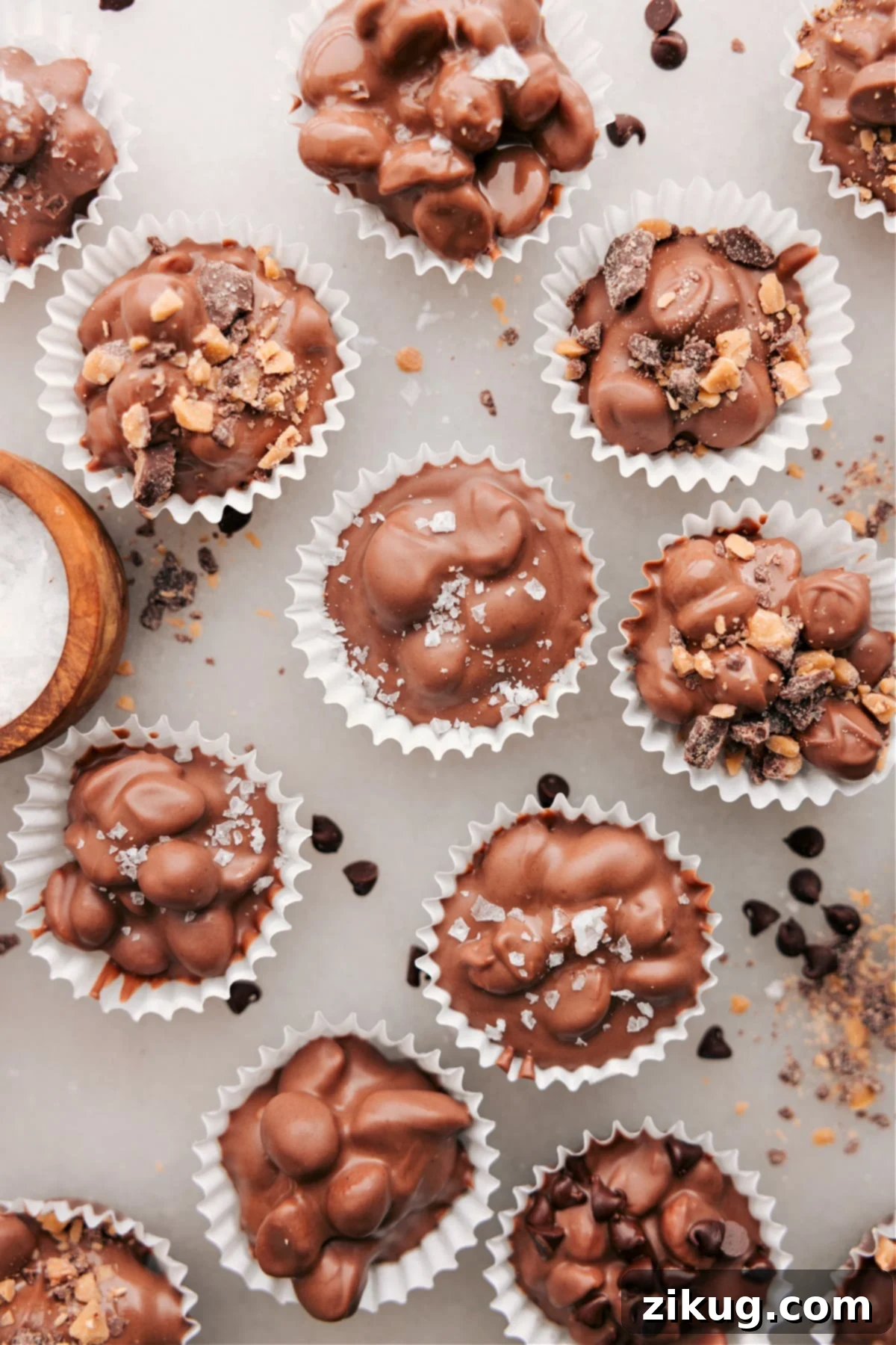 Crockpot Candy clusters generously topped with crunchy toffee bits and delicate flaky sea salt.