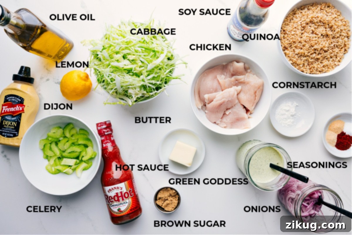 Key Ingredients for the Best Buffalo Chicken Bowl All the fresh ingredients meticulously prepped for constructing the perfect Buffalo Chicken Bowl, including vibrant cabbage, lean chicken, savory soy sauce, wholesome quinoa, cornstarch, a medley of seasonings, creamy dressing, crisp onions, rich butter, classic hot sauce, crunchy celery, zesty Dijon mustard, and a bright lemon.