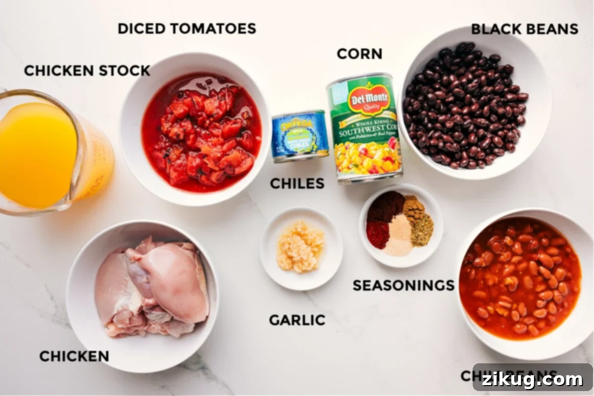 Essential Ingredients for the Best Chicken Taco Soup A vibrant selection of fresh ingredients laid out, including chicken thighs, canned beans, corn, diced tomatoes, green chiles, broth, and taco seasoning, all ready for the Chicken Taco Soup.