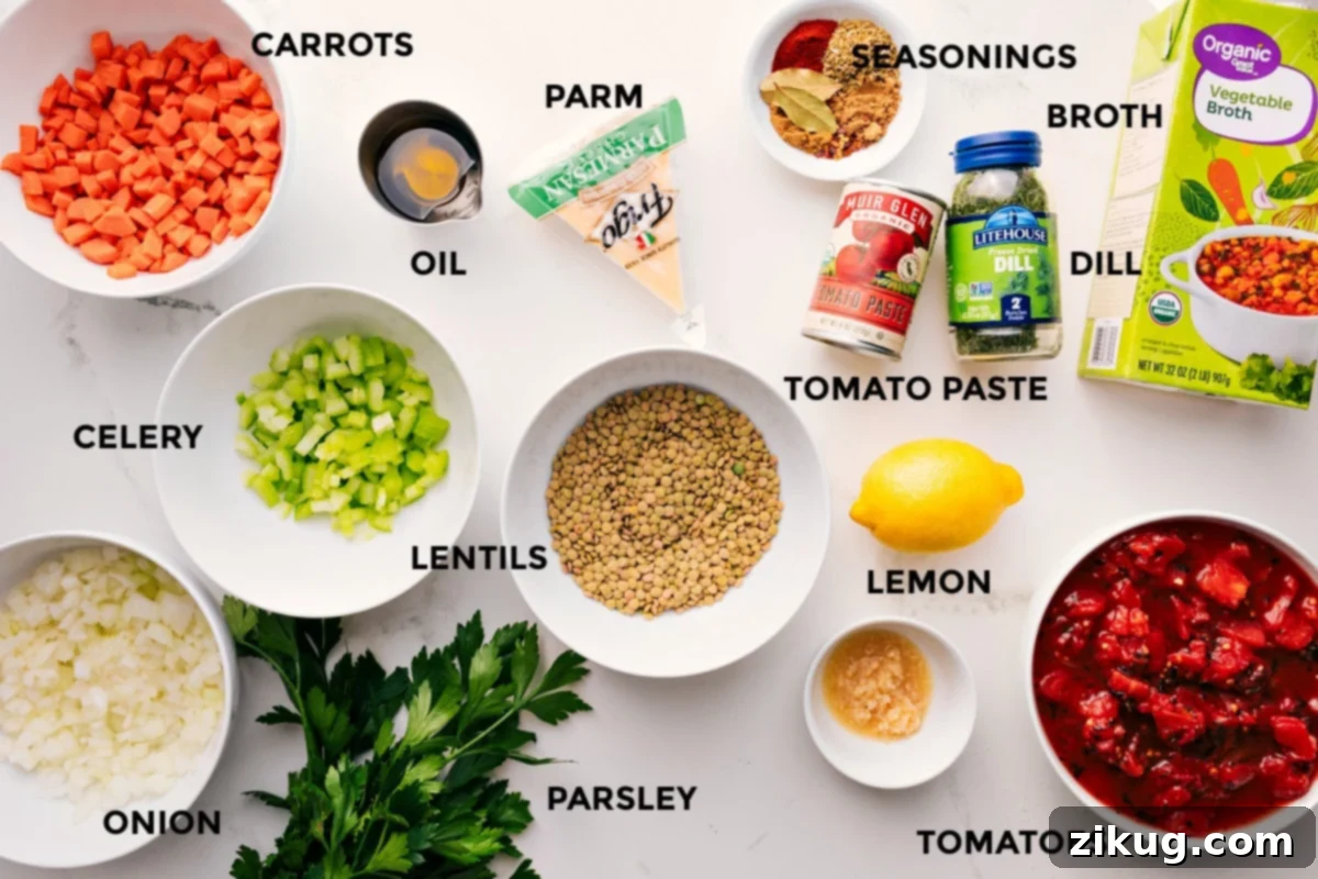 Ingredients In Mediterranean Lentil Soup All the vibrant ingredients meticulously prepped and arranged, including carrots, celery, onion, lentils, fresh parsley, minced garlic, diced tomatoes, a bright lemon, an assortment of seasonings, concentrated tomato paste, fresh dill, and rich broth, all ready for the creation of Mediterranean lentil soup.