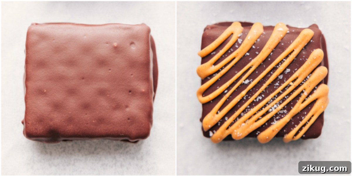 The Best Peanut Butter Chocolate Treat: Buckeye Graham Crackers The exquisite Buckeye Graham Cracker, perfectly dipped in dark chocolate and elegantly drizzled with creamy peanut butter, then finished with a sprinkle of flaky sea salt, creating a delectable balance of sweet and salty flavors.