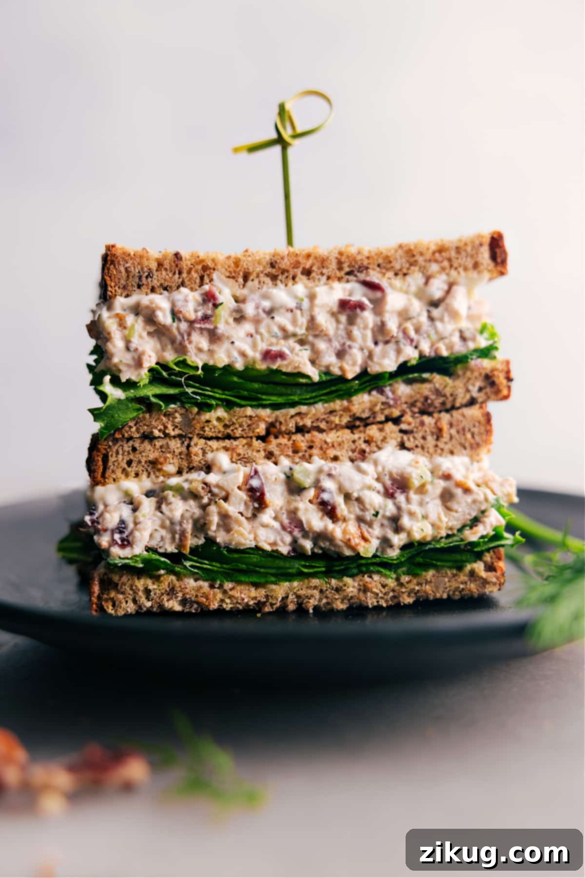 Classic Turkey Salad Sandwich: Fresh, Creamy, and Ready to Savor Delicious Turkey Salad sandwich, perfectly prepared and cut in half, showcasing the fresh lettuce and creamy filling, ready to be enjoyed.
