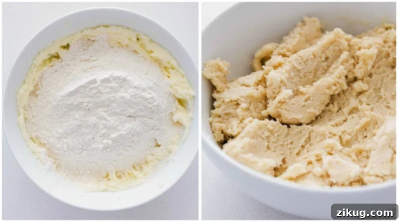 How To Make Thumbprint Cookies Recipe All-purpose flour being gently mixed into the creamed butter and sugar, forming the rich dough for thumbprint cookies.