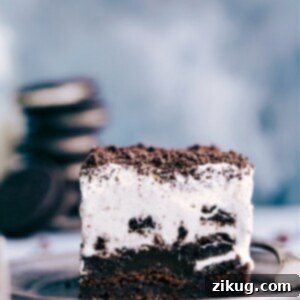 A beautifully presented Brownie Oreo Ice Cream Cake, showcasing all its layers.