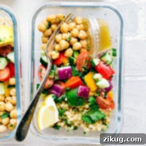 Make-Ahead Greek Couscous Salad 3 Greek couscous salad in a glass container for lunch.