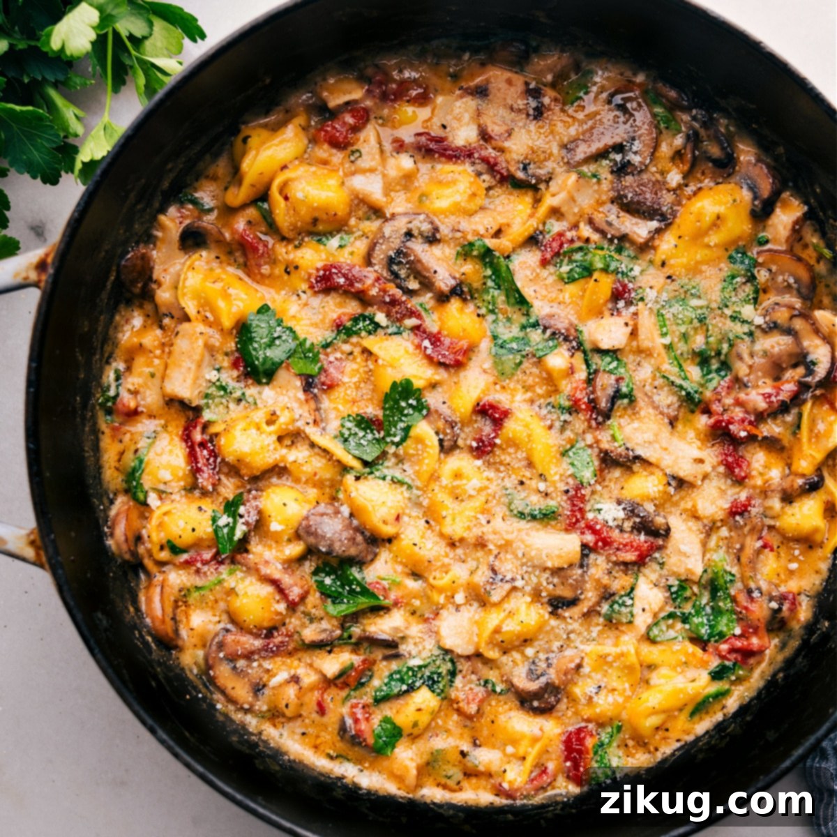 The Best Chicken Tortellini The complete dish in a pot ready to be served.