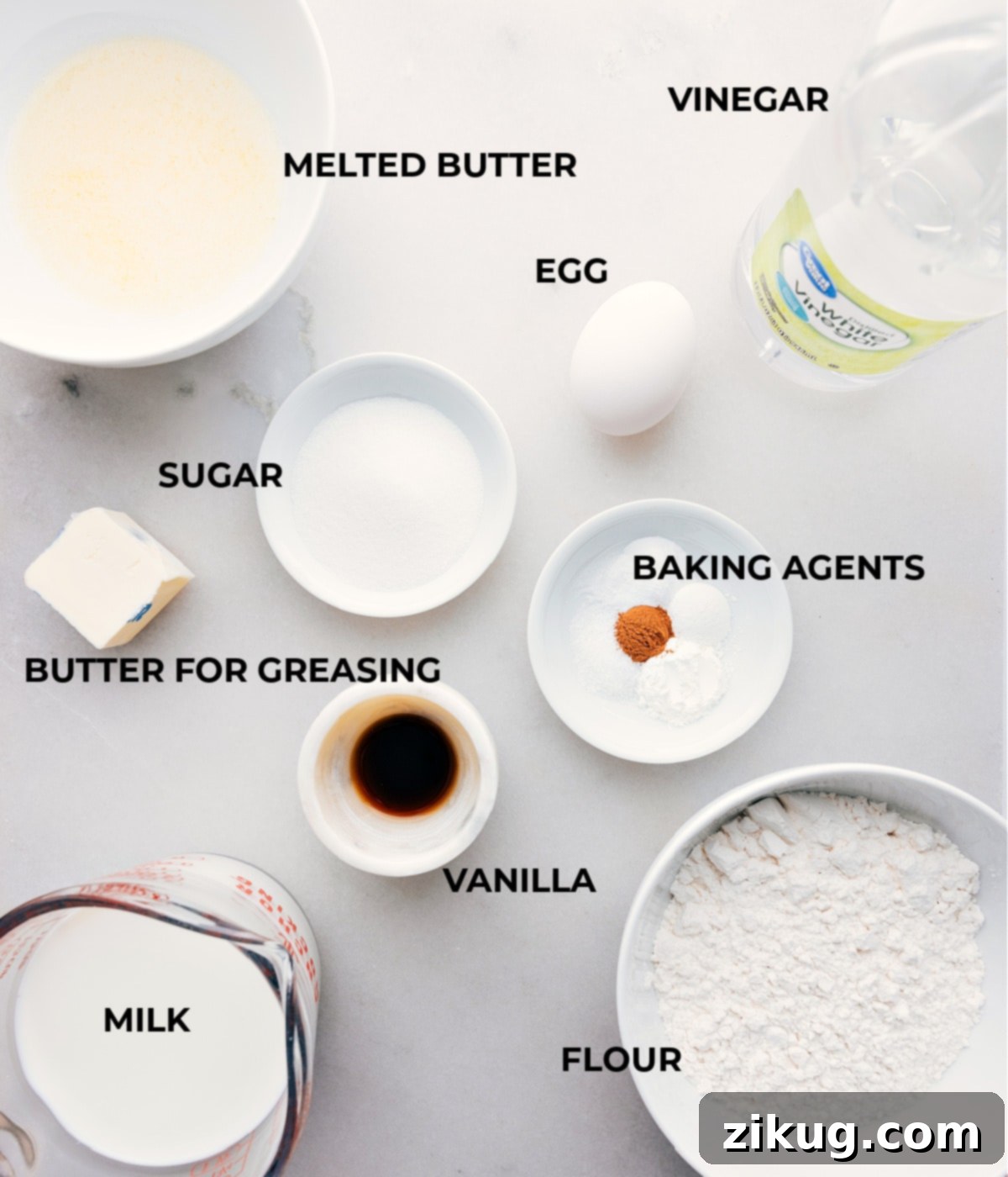 Essential Ingredients for Homemade Old-Fashioned Pancakes The assorted ingredients used in this Old-Fashioned Pancake Recipe, laid out on a clean surface.